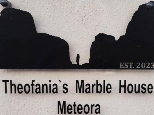 a sign on a wall with the melbourne market house at Theofania's Marble House Meteora in Kastrákion