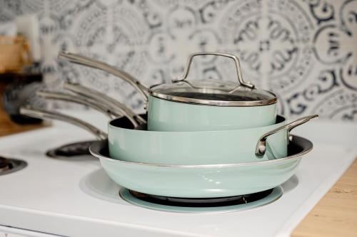 a bowl on a stove with a pot on it at Petite Paradise in Dayton