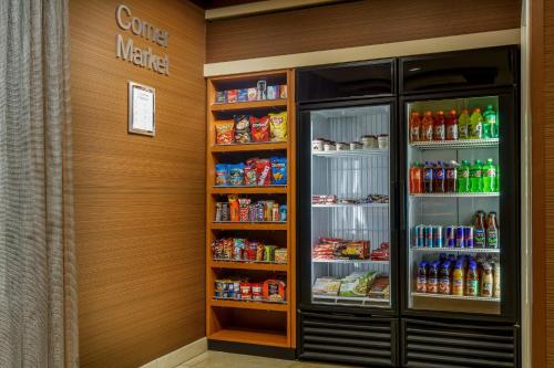 a store with an open refrigerator with drinks at Fairfield by Marriott Peoria East in Peoria