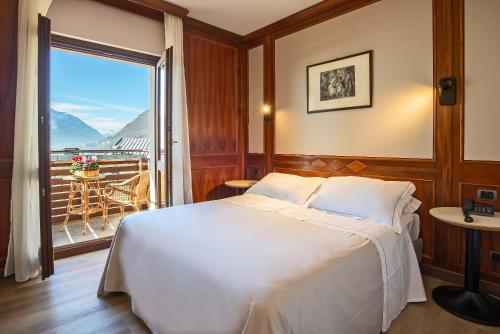 Postel nebo postele na pokoji v ubytování Relais Du Foyer