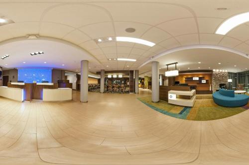 an empty lobby of a hospital with a large room with aocrates at Fairfield Inn & Suites by Marriott Phoenix Tempe/Airport in Tempe
