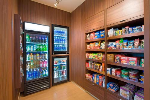 a room with a refrigerator and lots of food at Fairfield Inn & Suites by Marriott Phoenix Tempe/Airport in Tempe