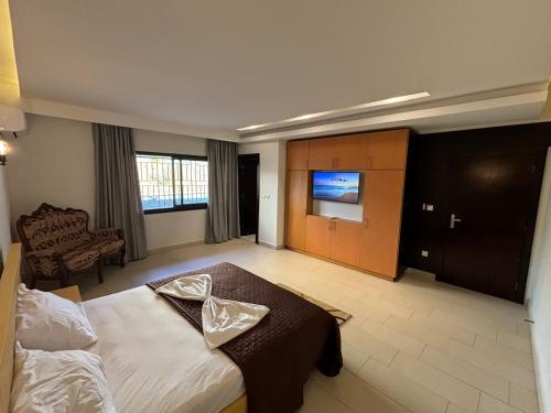 Un televizor și/sau centru de divertisment la Villa Torino 2 - moderne et spacieuse avec toutes les commodités pour vous sentir chez vous