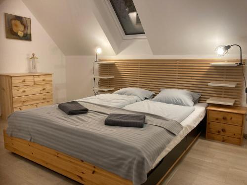 Postel nebo postele na pokoji v ubytování Apartmán Krkonoše Rokytnice