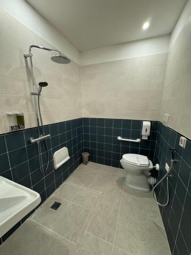 Koupelna v ubytování Modi Hotel