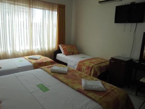 Hotel Marux Plazaにあるベッド