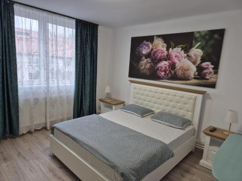 Ένα ή περισσότερα κρεβάτια σε δωμάτιο στο Apartament spatios 2 camere