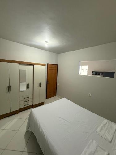 Ένα ή περισσότερα κρεβάτια σε δωμάτιο στο Casa Azul 2 quartos