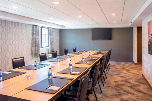 a large conference room with a long table and chairs at Fairfield Inn & Suites by Marriott Providence Airport Warwick in Warwick