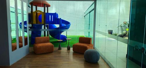 Area soggiorno di Apartamento no Edifício Manhattan - Bairro Nobre de Caruaru