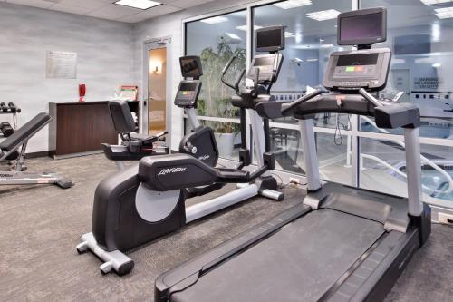 a gym with tread machines and a treadmill at Fairfield Inn & Suites Raleigh-Durham Airport/Brier Creek in Durham
