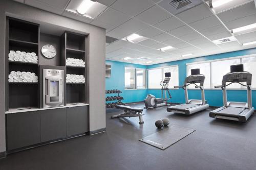 a gym with treadmills and machines in a room at Fairfield Inn & Suites by Marriott Belle Vernon in Belle Vernon