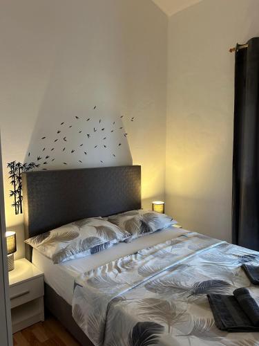Katil atau katil-katil dalam bilik di Apartman Viktoria