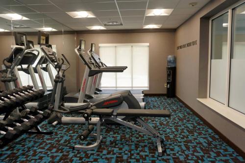 a gym with cardio equipment in a hotel room at Fairfield by Marriott Inn & Suites Jonestown Lebanon Valley in Jonestown