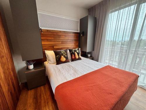 Ένα ή περισσότερα κρεβάτια σε δωμάτιο στο Flax Pod 41