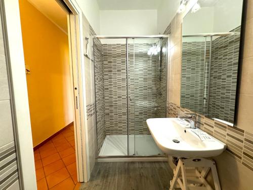 a bathroom with a sink and a shower at Casa di Mami in Capaci