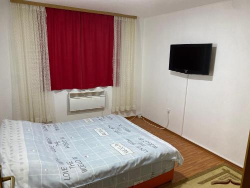 Ένα ή περισσότερα κρεβάτια σε δωμάτιο στο Apartman Nikola