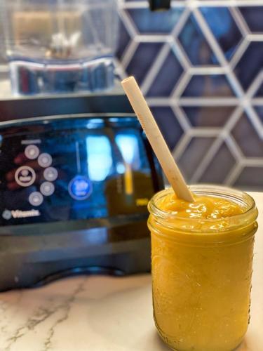 a jar of honey next to a camera at Channel Islands Beach Retreat in Oxnard