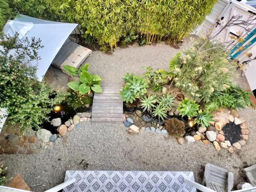 an aerial view of a garden with plants and a pathway at Channel Islands Beach Retreat in Oxnard