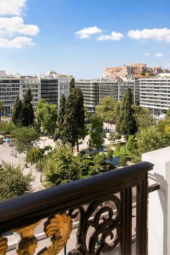 a view of a city from a balcony at Hotel Grande Bretagne, a Luxury Collection Hotel, Athens in Athens