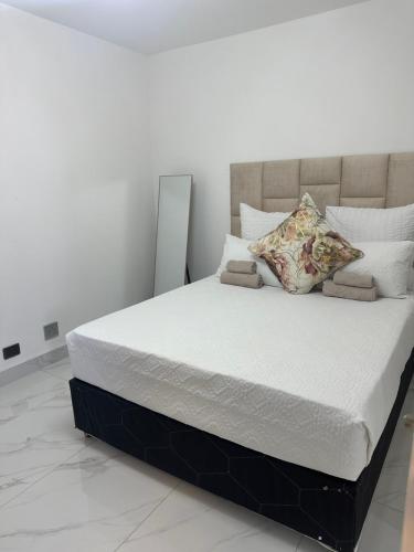 Ένα ή περισσότερα κρεβάτια σε δωμάτιο στο Oceanic gem