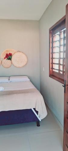 Postel nebo postele na pokoji v ubytování Chalé Sol de Macapá 2 - Sua Casa pertinho do Mar