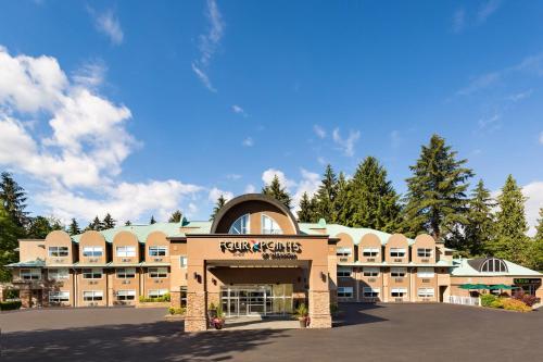 a rendering of the front of a resort building at Four Points by Sheraton Surrey in Surrey