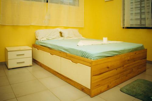Postel nebo postele na pokoji v ubytování maison 3 pièces tranquille à Calavi