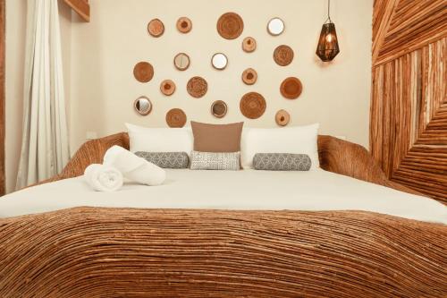 Katil atau katil-katil dalam bilik di CervecerIa Tulum Boutique Hotel & Beer Spa