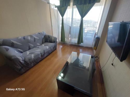 TV a/nebo společenská místnost v ubytování Viña Plaza 1