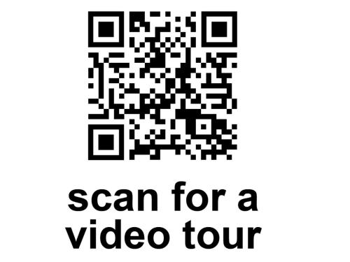 a sign that says scan for a video tour at Pavic SPA Milmari L34 in Kopaonik