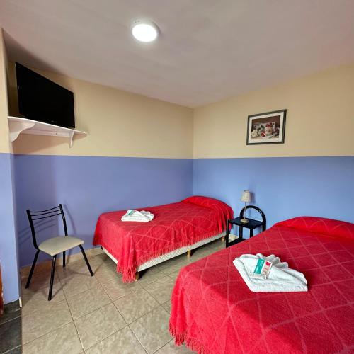 Postel nebo postele na pokoji v ubytování Hosteria Los 2 Pinos