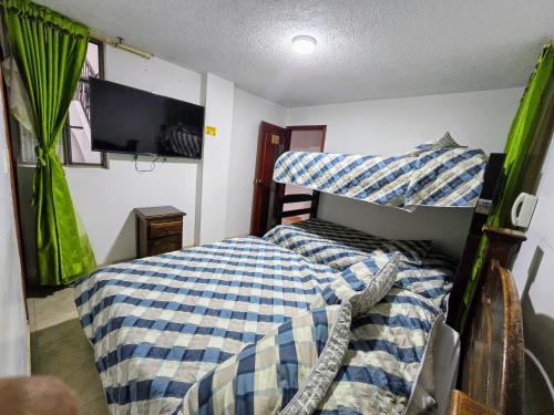 Un pat sau paturi într-o cameră la Hotel Class