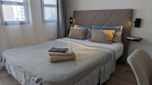 Foto Cosy Bungalow with Terrace & Jacuzzi 2