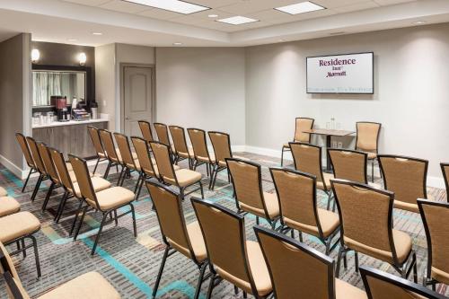 a room with rows of chairs in a waiting room at Residence Inn by Marriott Franklin Cool Springs in Franklin