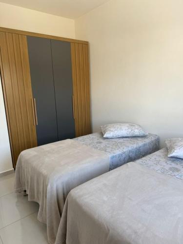 Postel nebo postele na pokoji v ubytování Casa na praia de Zimbros