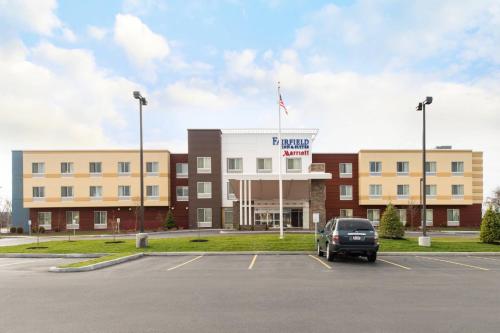 a car parked in a parking lot in front of a hospital at Fairfield Inn & Suites by Marriott Utica in Utica