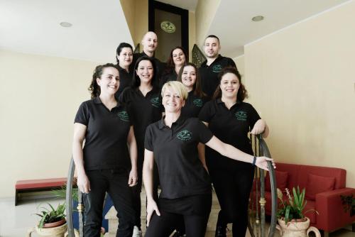 a group of people posing for a picture at Hotel La Quercia in Valmontone