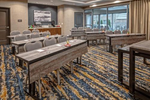 a conference room with rows of tables and chairs at Residence Inn by Marriott Nashville Green Hills in Nashville