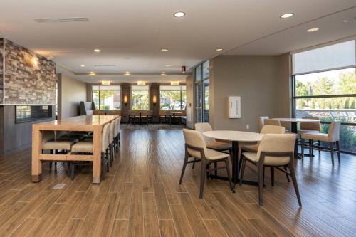 a dining room with a table and chairs at Residence Inn Nashville Mt. Juliet in Mount Juliet