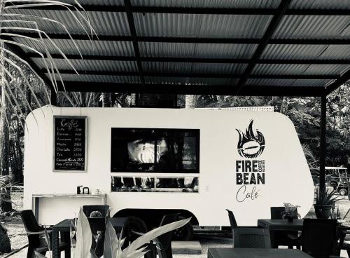 a food truck with a sign on the side of it at Sunny 2-bed condo - fast WIFI in Puntarenas