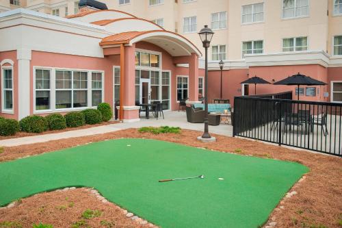 a putting green in front of a building at Residence Inn Birmingham Hoover in Hoover