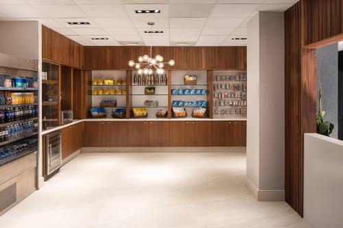 a pharmacy aisle with a pharmacyacistacistacistasteryasteryasteryasteryasteryasteryastery at Palm Beach Gardens Marriott in Palm Beach Gardens