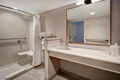 a bathroom with a sink and a mirror at Fairfield Inn & Suites Las Vegas Airport South in Las Vegas