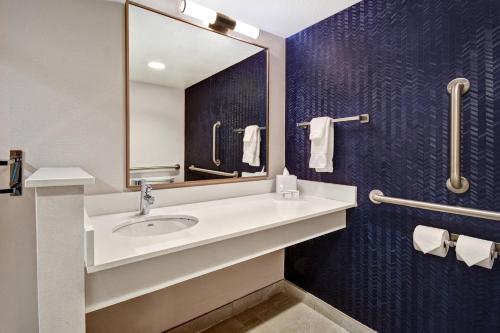 a bathroom with a sink and a mirror at Fairfield Inn & Suites Las Vegas Airport South in Las Vegas