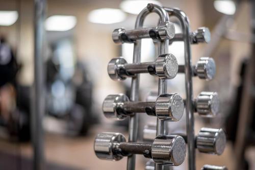 a group of metal knobs on a metal pole at Frankfurt Marriott Hotel in Frankfurt/Main