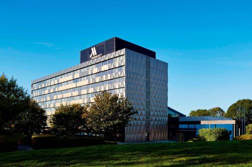 a building with a sign on the top of it at Portsmouth Marriott Hotel in Portsmouth