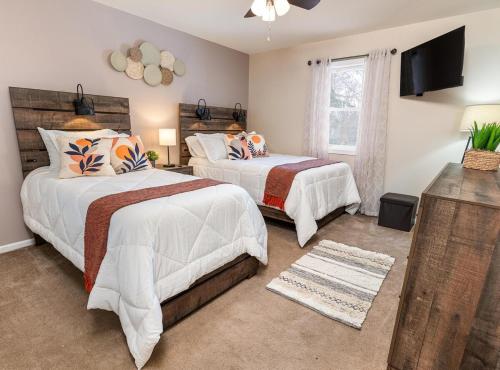 Postel nebo postele na pokoji v ubytování Game&GatherLodge