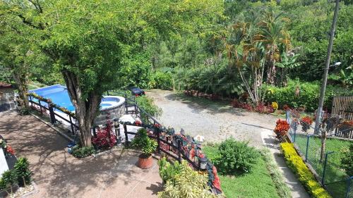 an overhead view of a garden with a swimming pool at Iraka Campestre Quindio in El Edén