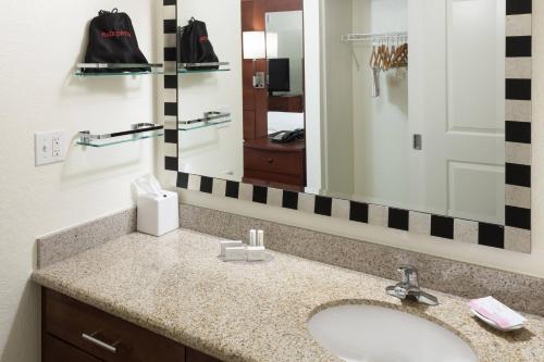a bathroom with a sink and a mirror at Residence Inn Boston Marlborough in Marlborough